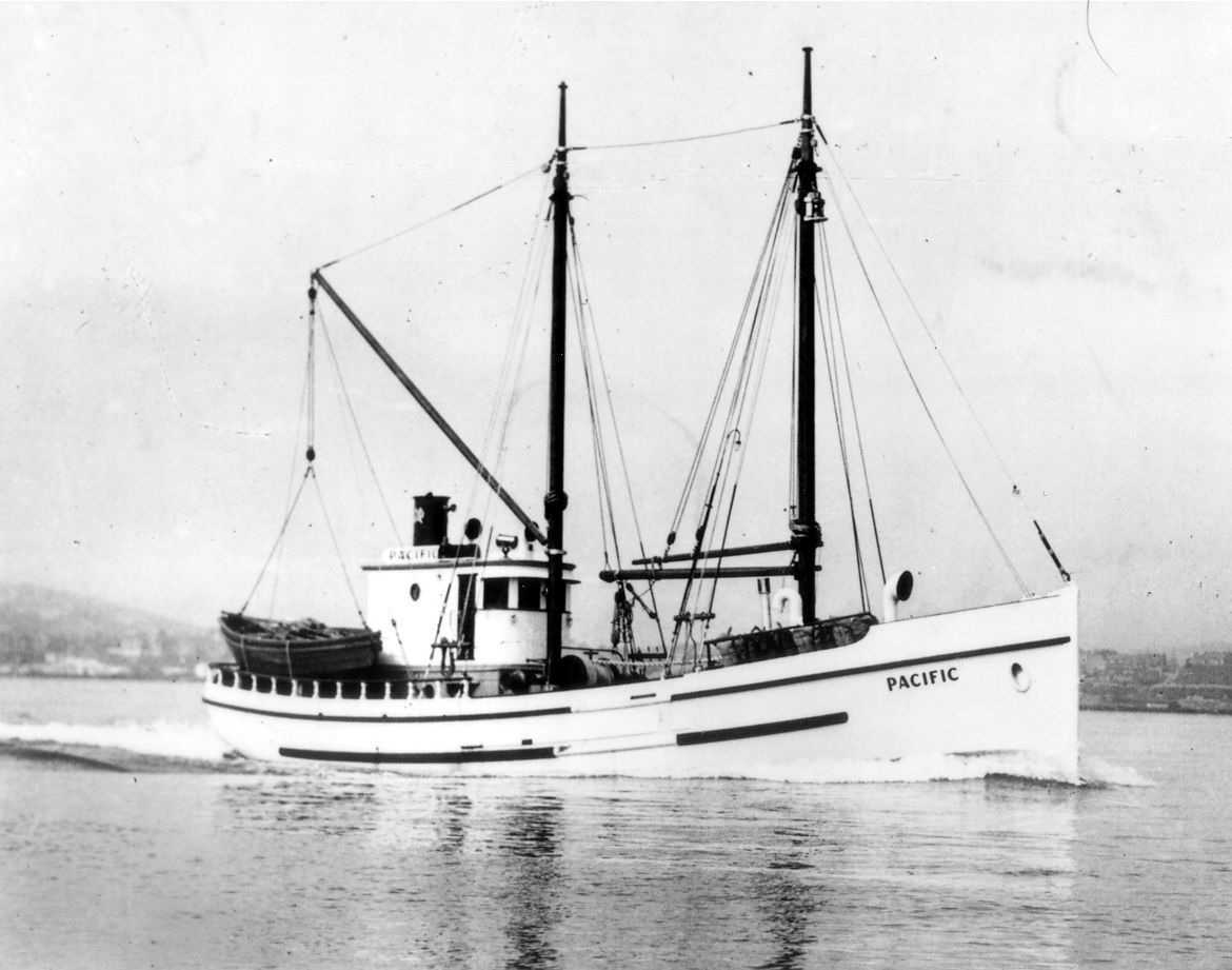 A black and white photo of a boat that says pacific on the side