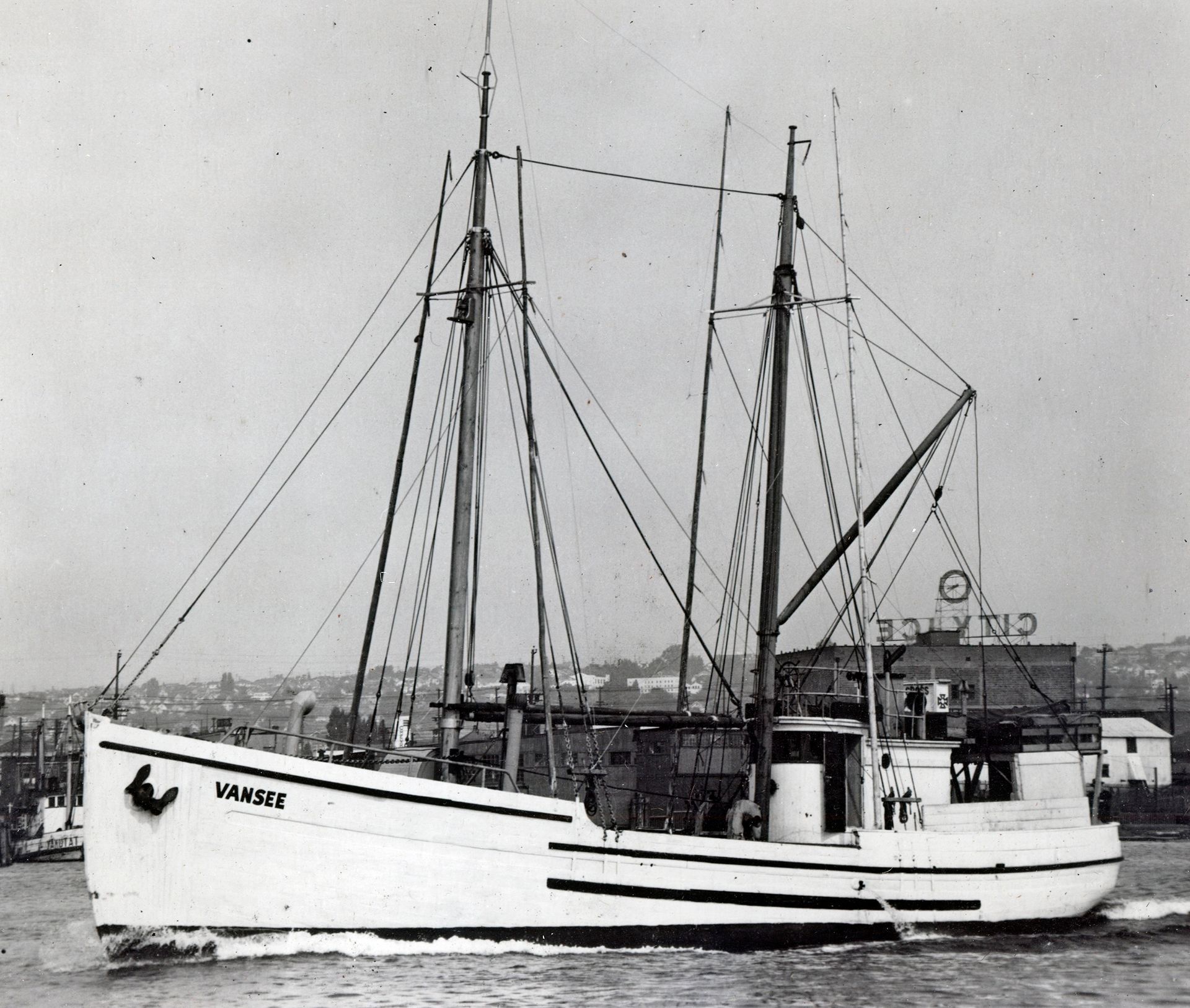 A black and white photo of a boat with the name marie on the side