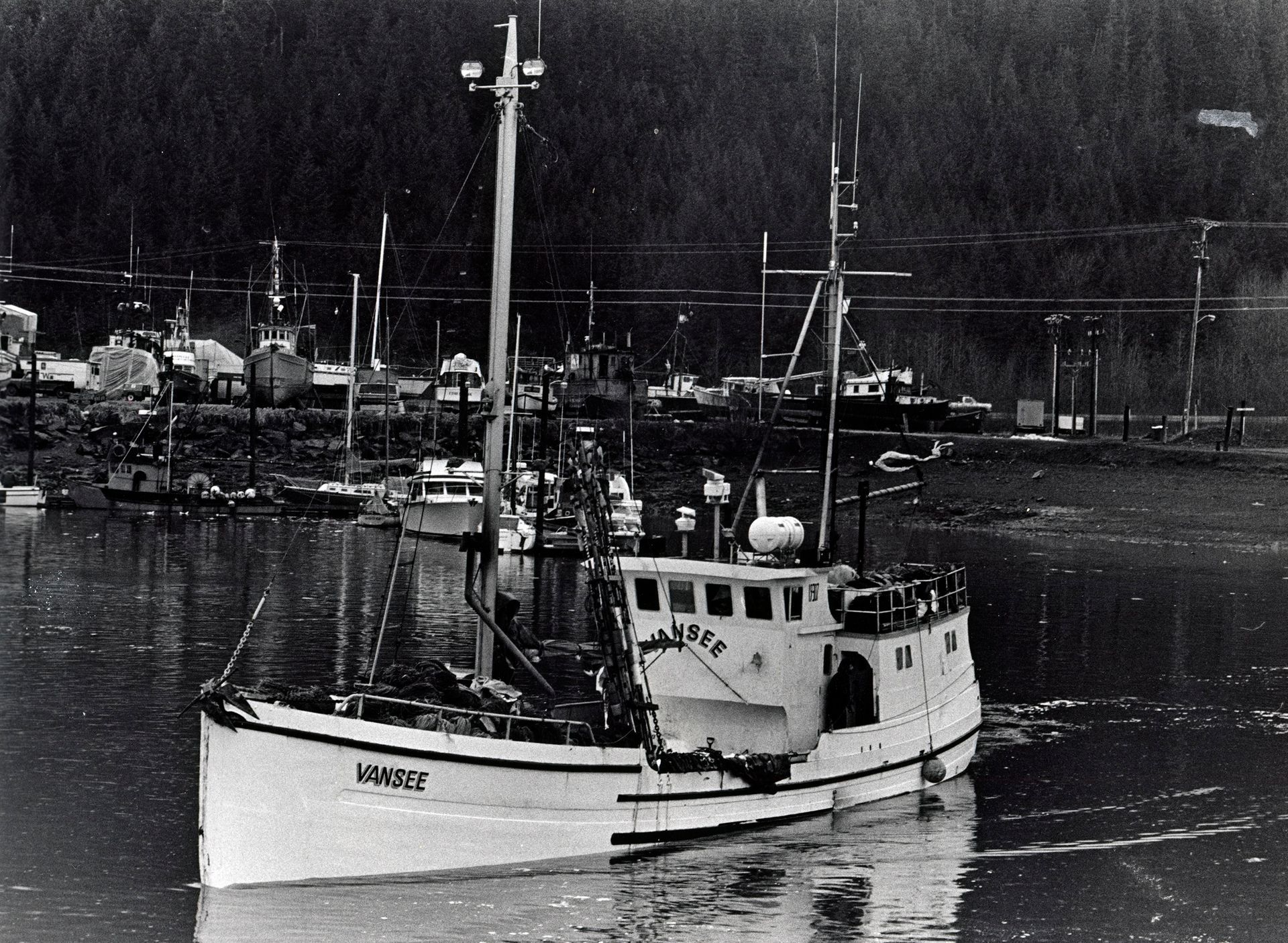 A black and white photo of a boat with the name vance on it