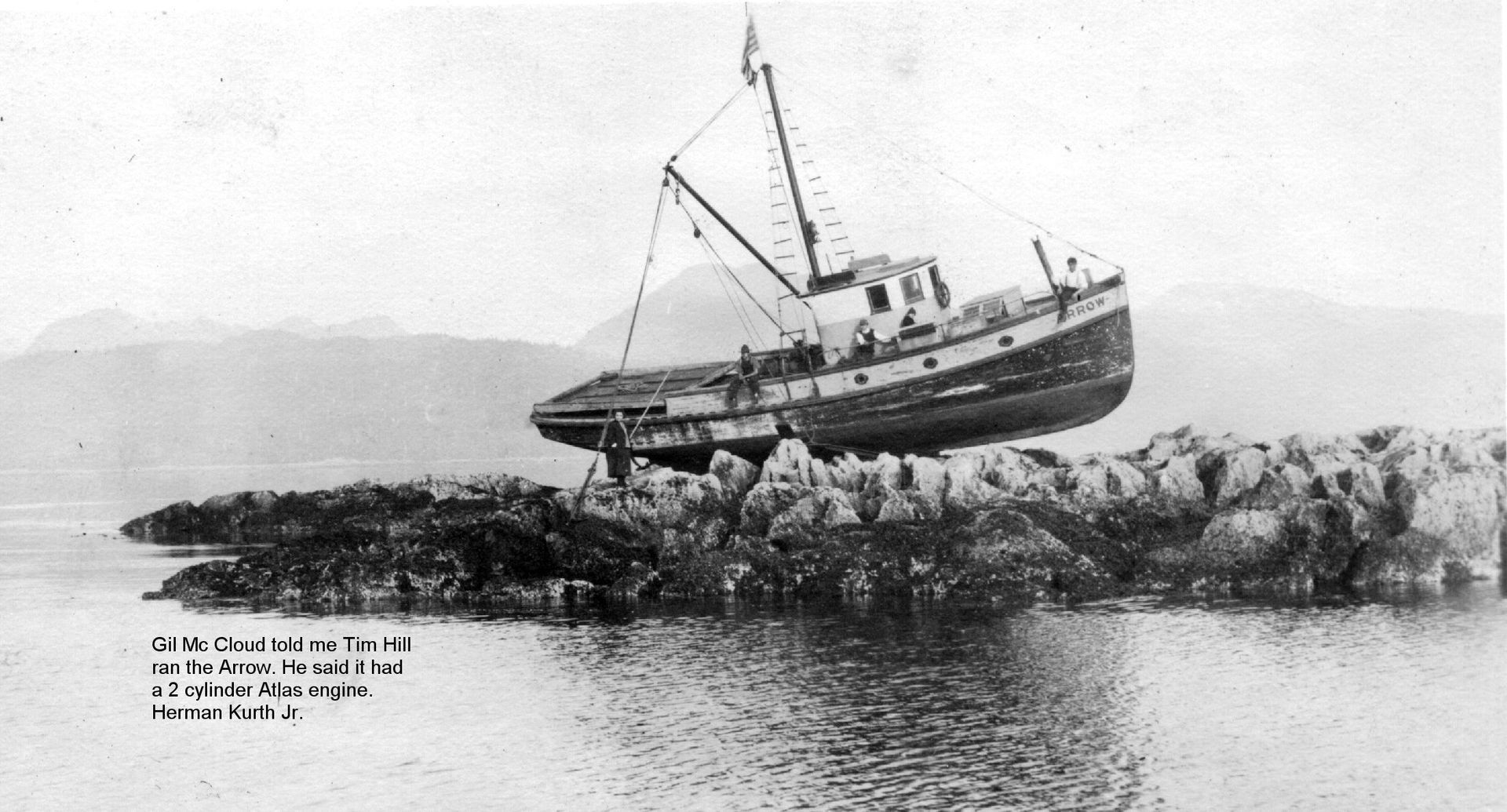 A black and white photo of a boat in the water