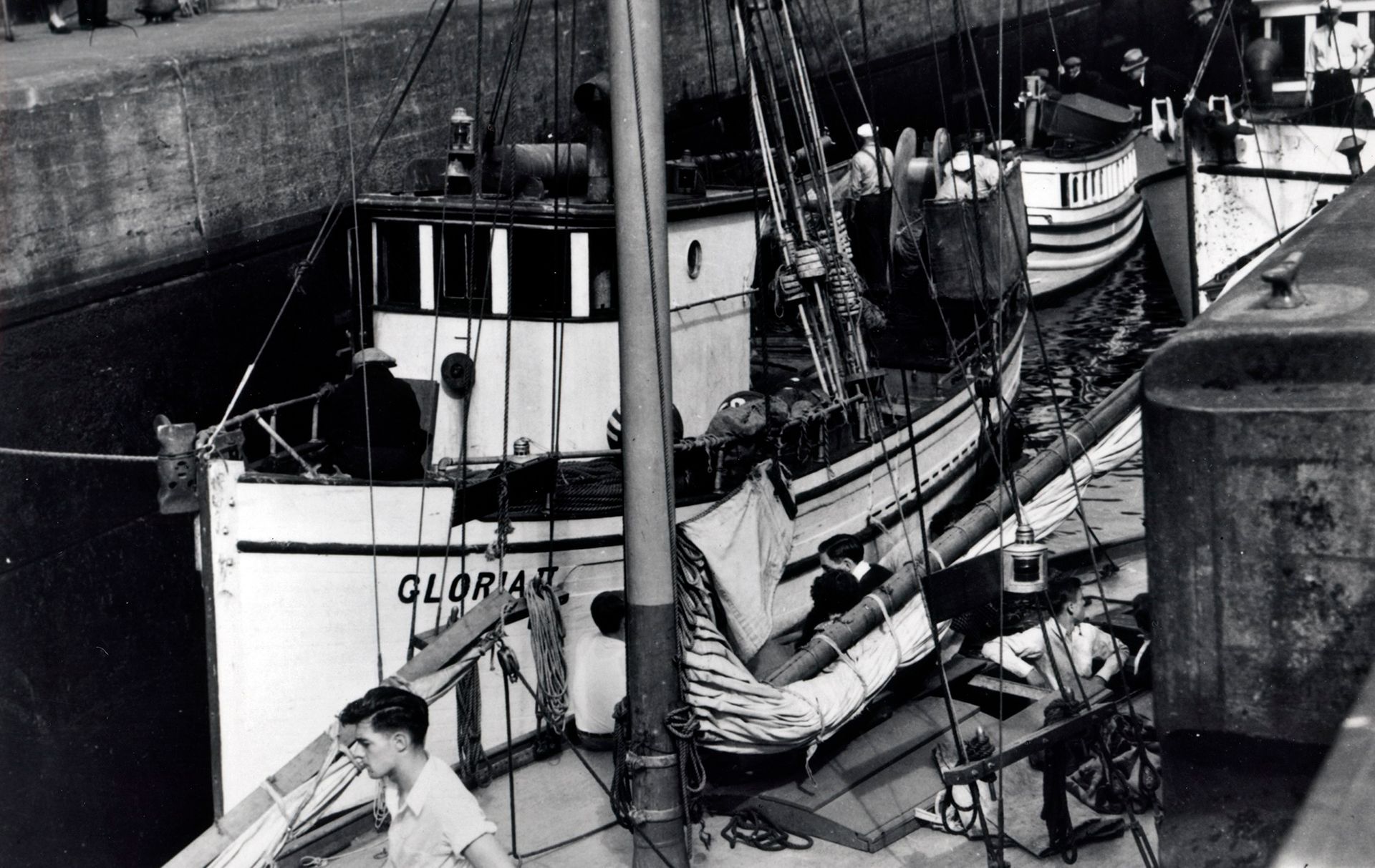 A black and white photo of a boat named glorian