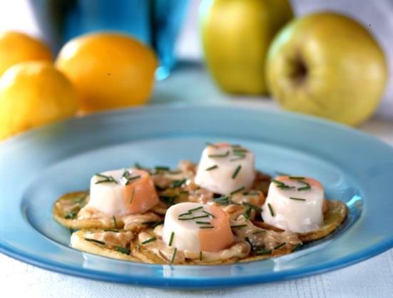 A blue plate with a few pieces of food on it