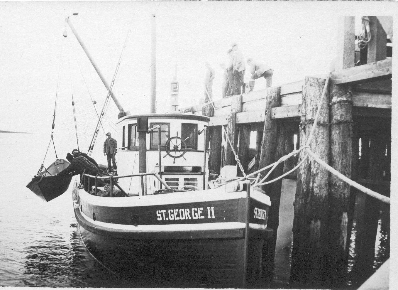 A black and white photo of a boat named st.george ii