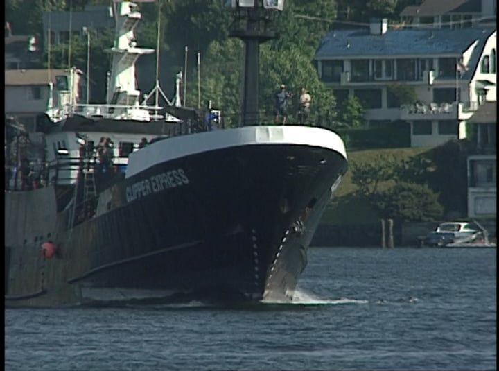 A large ship named super express is in the water