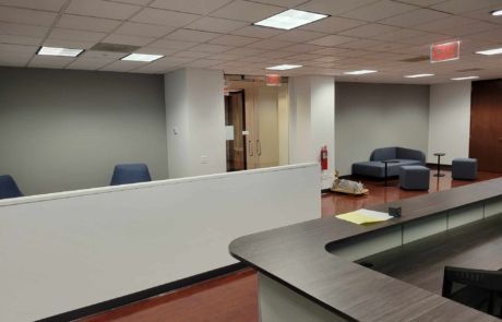 There is a fire extinguisher in the middle of the room.