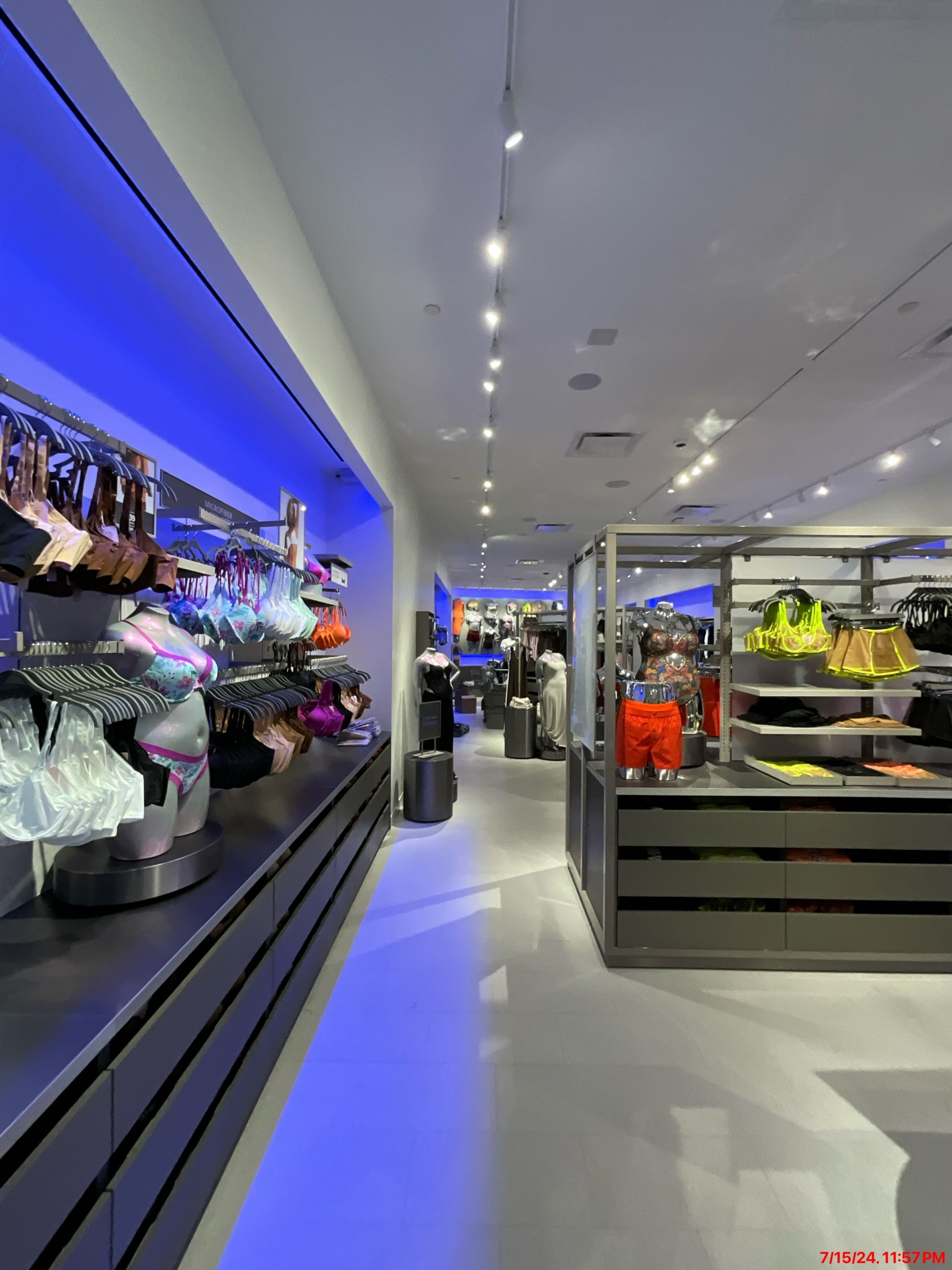 A store with a blue light on the ceiling