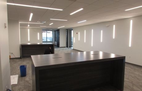 There is a large table in the middle of the room.