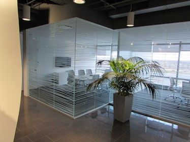 There is a plant in a pot in the middle of the room - Elgin, IL - Omni Commercial Group, Inc