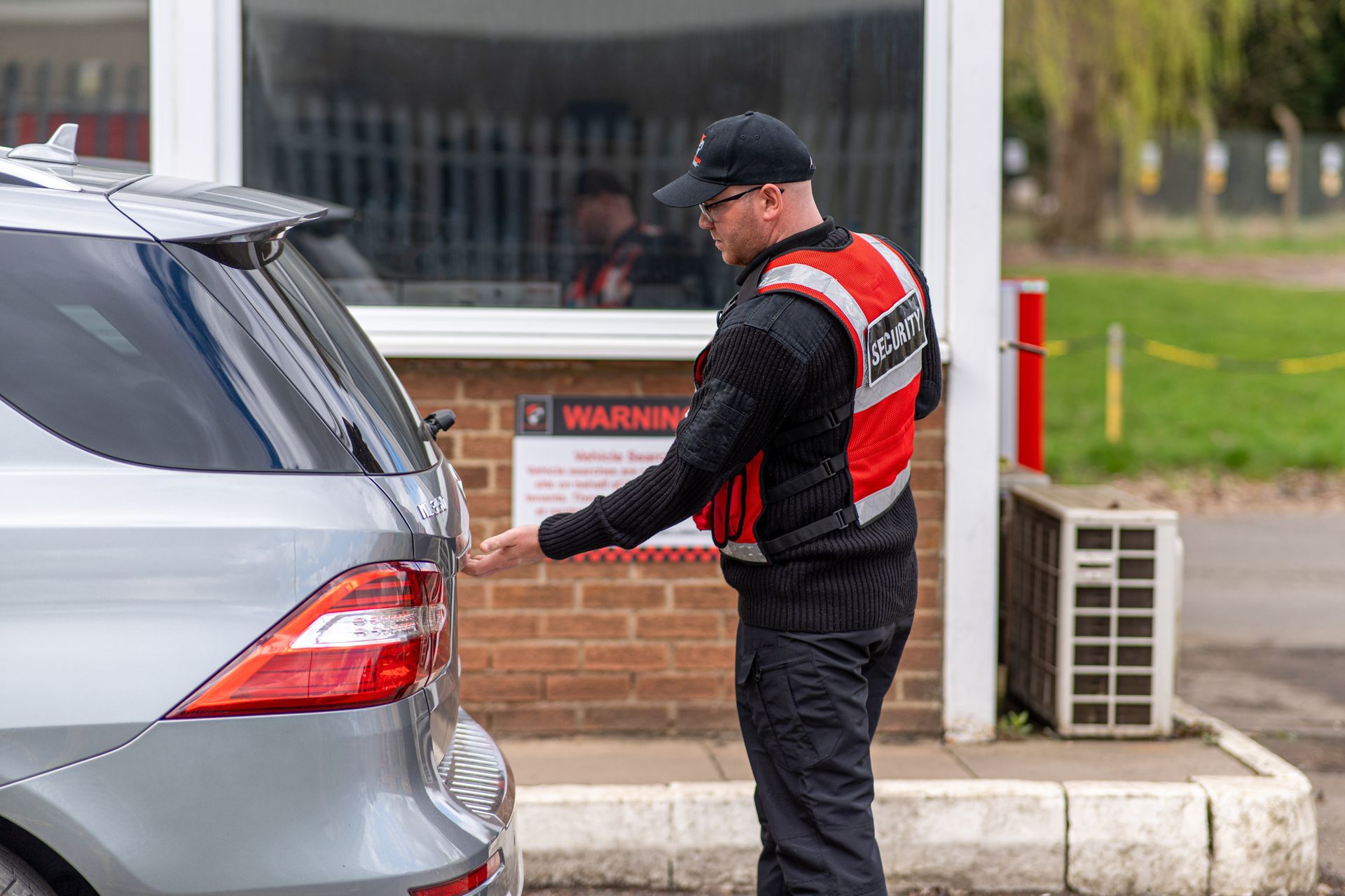 Security officer checking a boot 