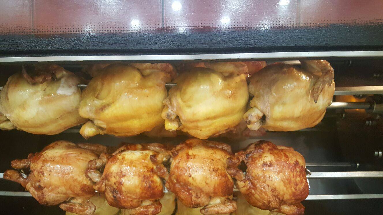 cottura dei polli allo spiedo