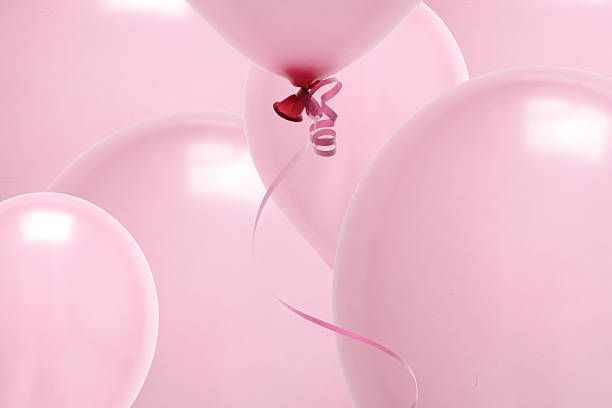 Opgeblazen roze balonnen.