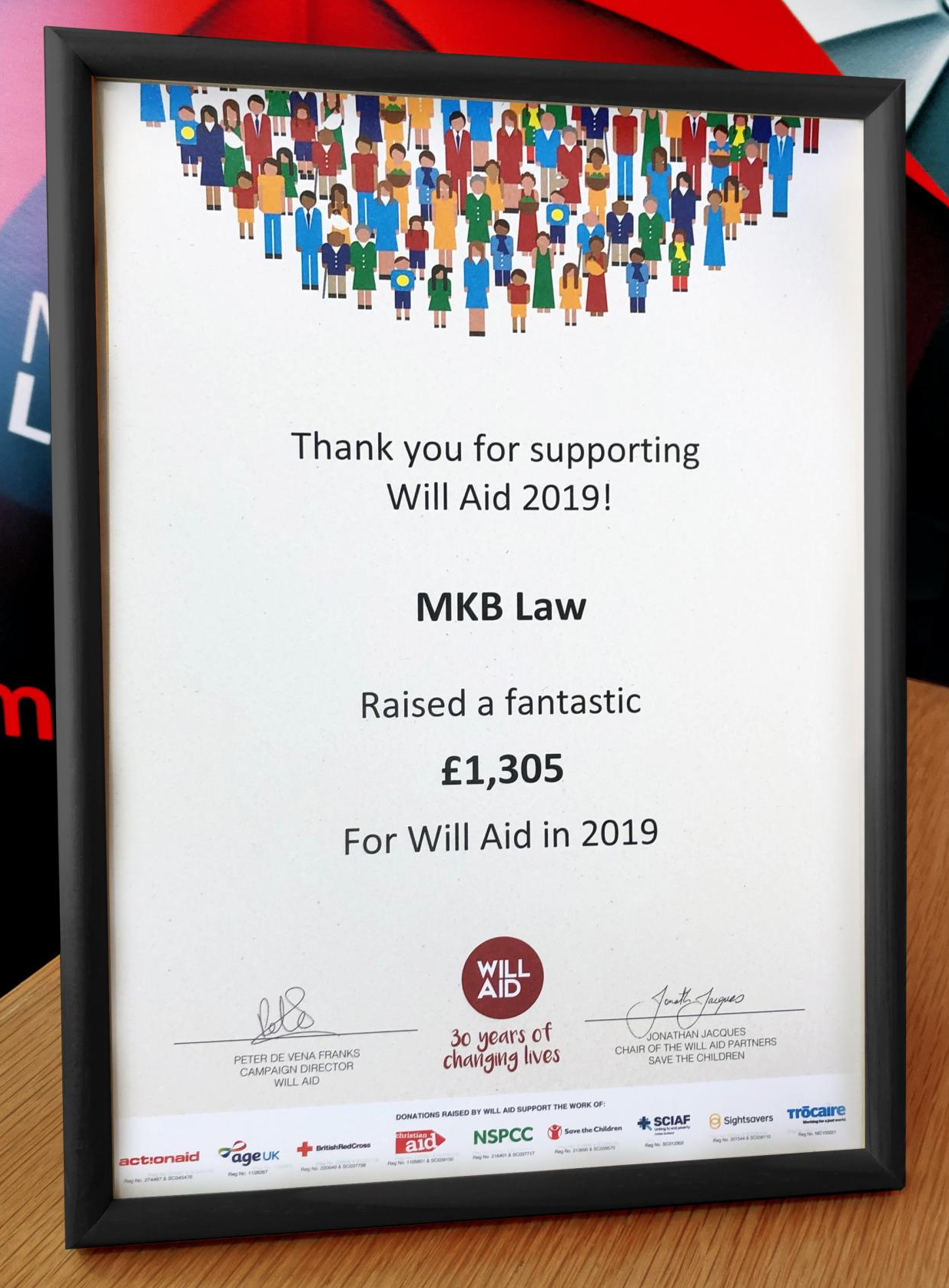 A framed certificate that says thank you for supporting will aid 2019