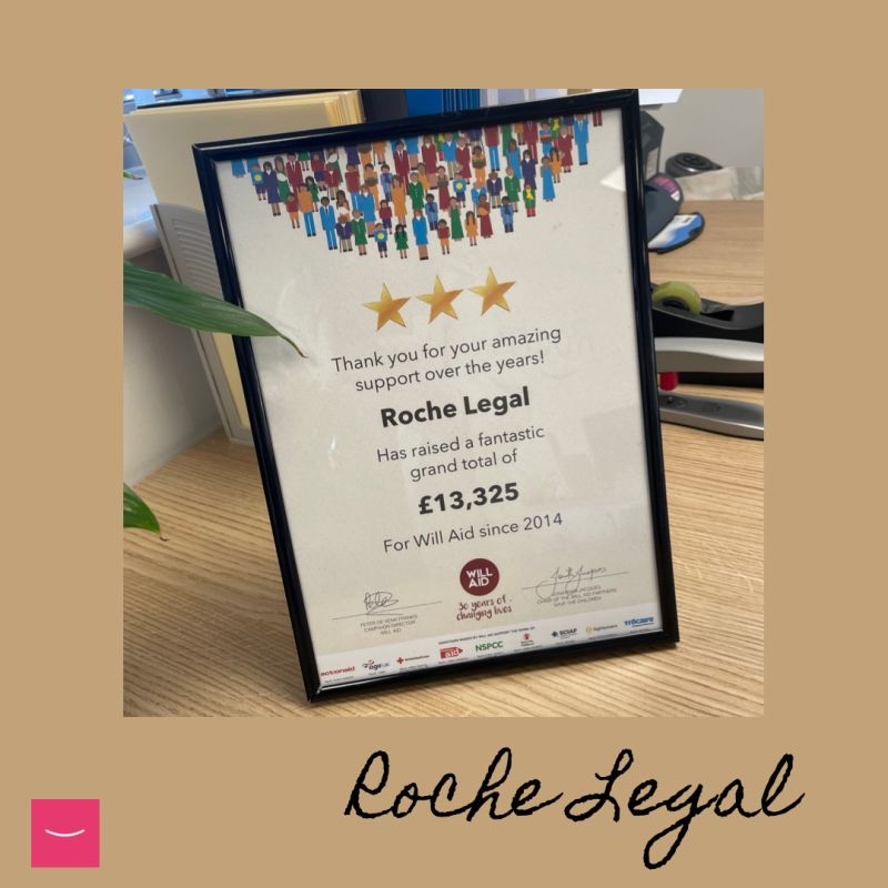 A framed certificate that says roche legal on it