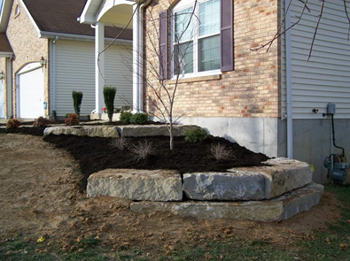 House With Pavers And Stones Outside | Saint Charles, MO | Bert's Lawn Maintenance