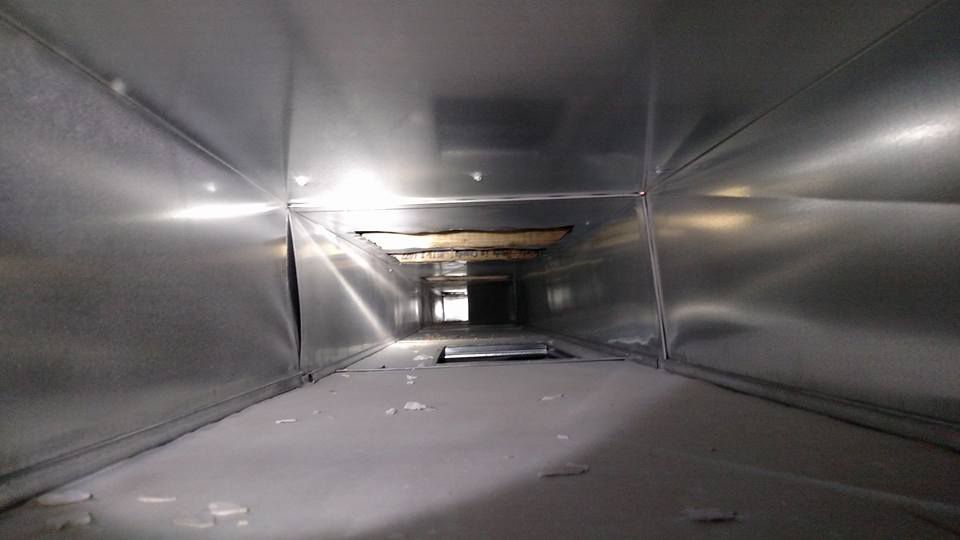 Metal Duct With a Light — Grand Island, NE — D&M Air Duct Cleaning