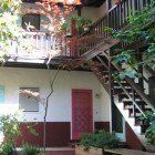 There are stairs leading up to the second floor of a building.