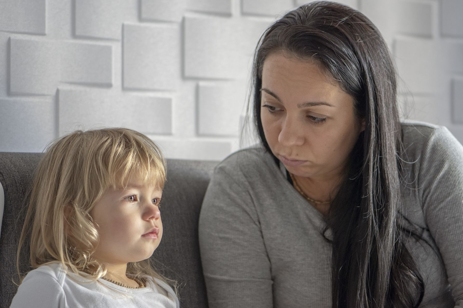 mother talking to daughter