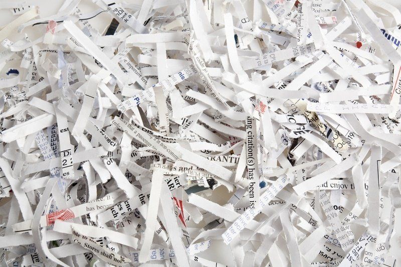 a pile of shredded paper is sitting on a table