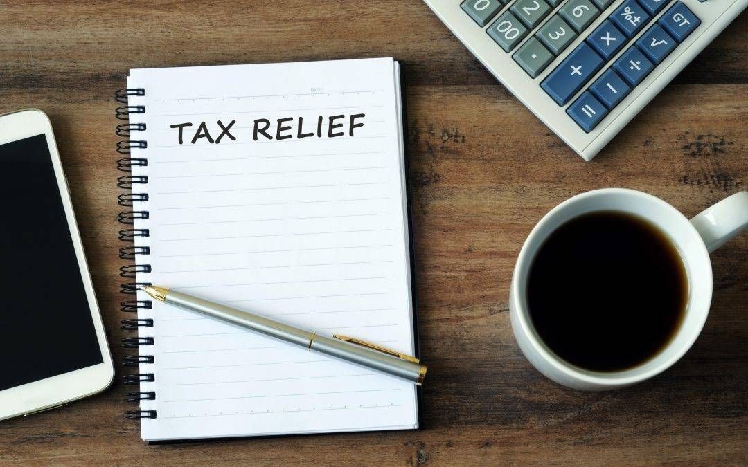 tax relief written on a notebook