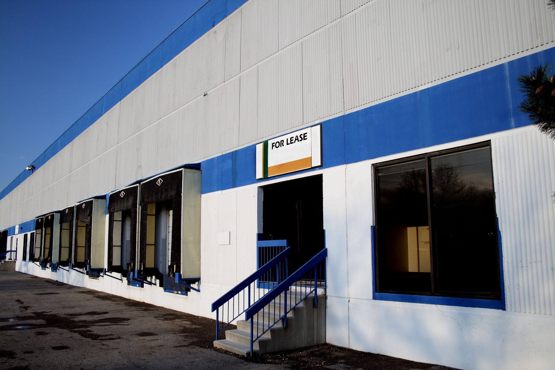 A white and blue building with the word miller on it