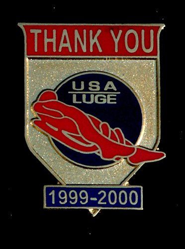 A pin that says thank you usa luge 1999-2000