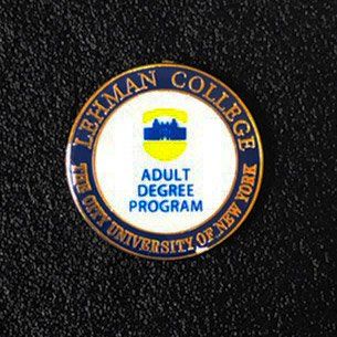 A pin that says adult degree program on it