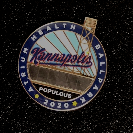 A pin that says kansapolis ballpark on it
