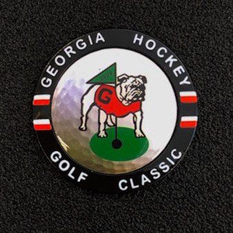 A georgia hockey golf classic logo with a bulldog on a green.