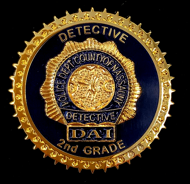 A detective badge from the police department of nassau