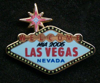 A welcome las vegas nevada pin with a star on top