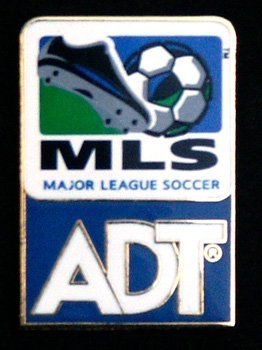 A pin that says mls major league soccer adt
