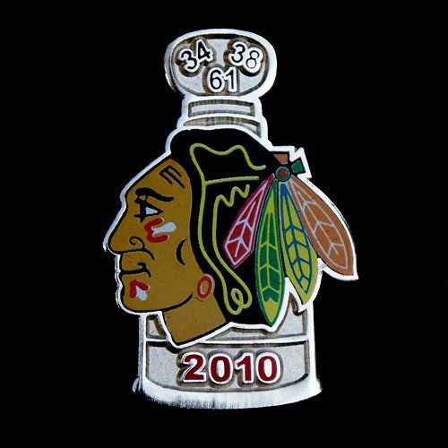 A pin with a picture of a native american and the year 2010