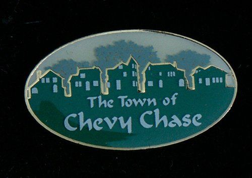 A pin that says the town of chevy chase