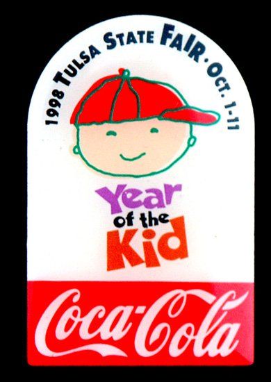 A coca cola advertisement for the 1998 tulsa state fair