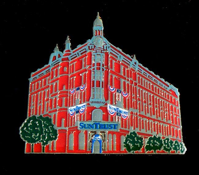 A drawing of the suntrust building with trees in front of it