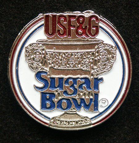 A coin that says usf & g sugar bowl on it