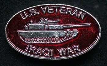 A u.s. veteran badge with a tank on it