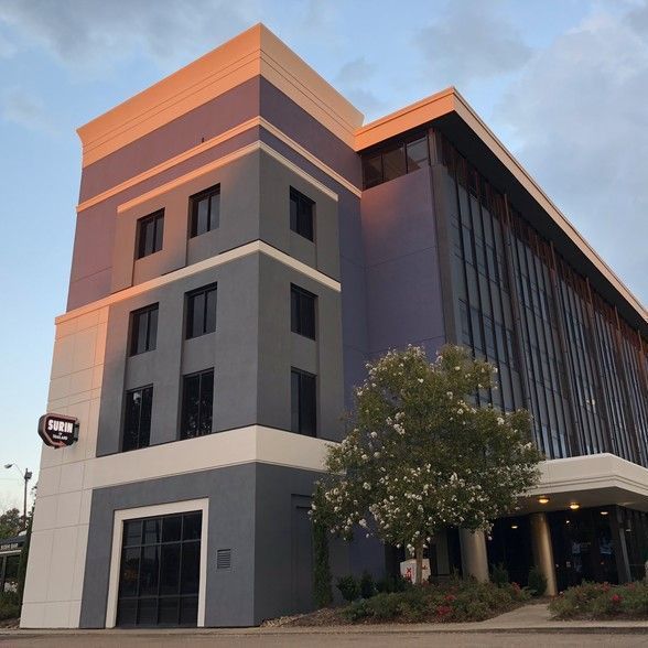 A large building with a sign that says ' abercrombie & fitch ' on it