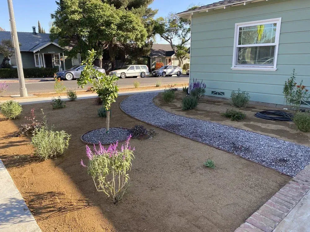A house with a walkway in front of it