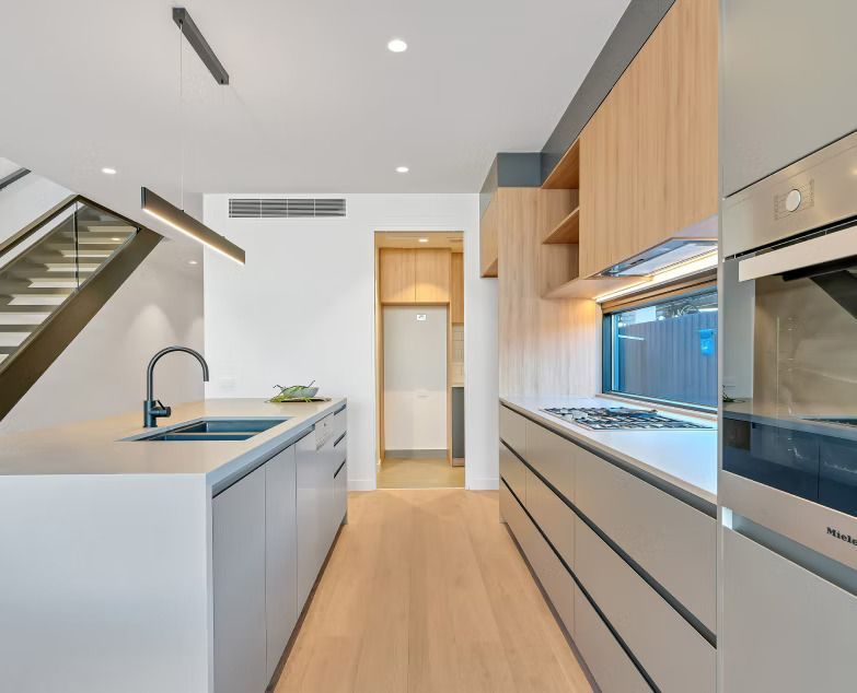 Wooden Wine Cabinet With Glass-doored Shelving — Maken Kitchens & Cabinets in Chinderah, NSW