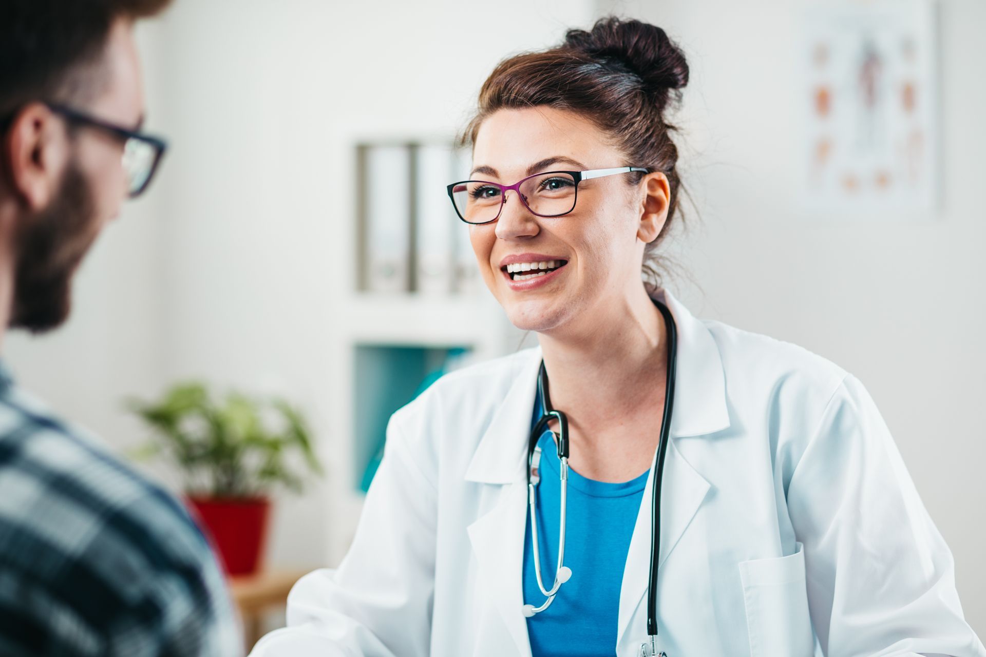A doctor is talking to a patient. A doctor is talking to a patient.