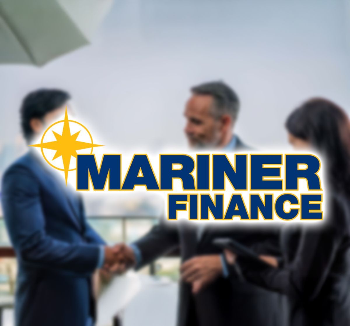 A group of people shaking hands in front of a mariner finance logo