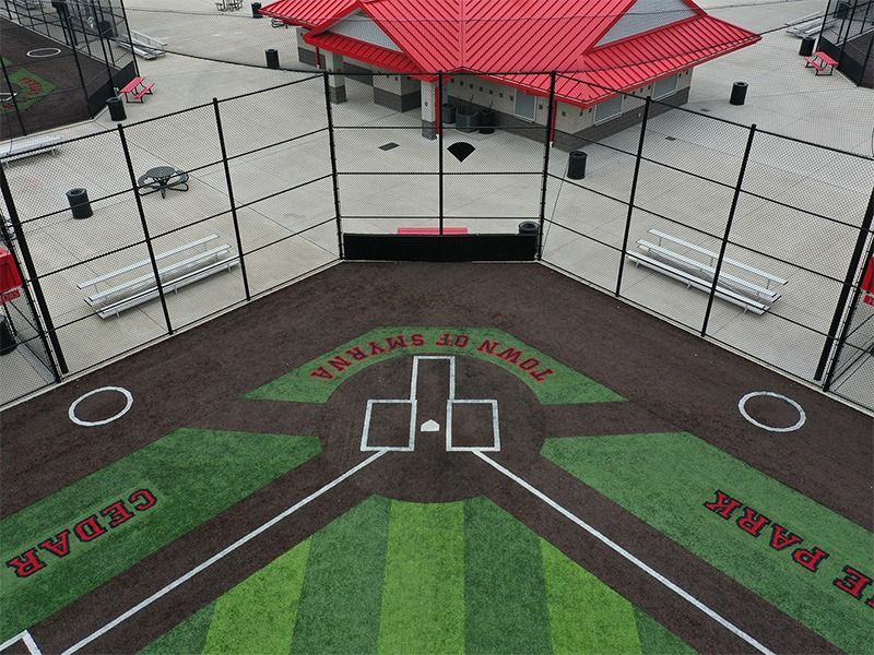 An aerial view of a baseball field in town park