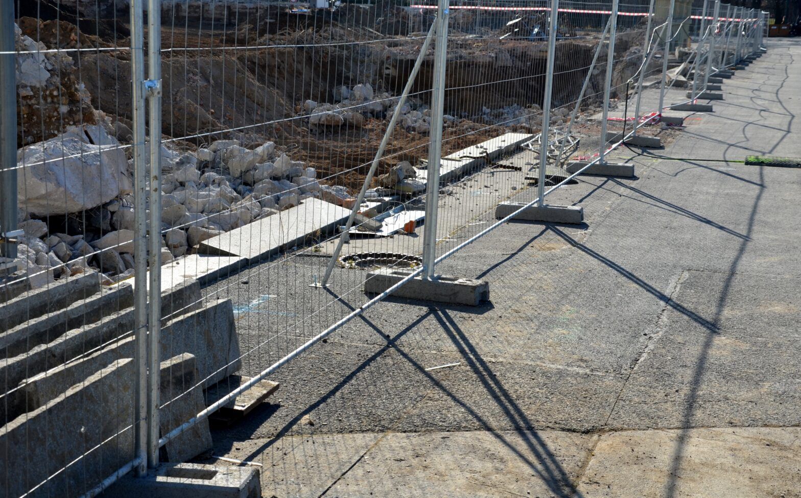 A fence is being built on a construction site.