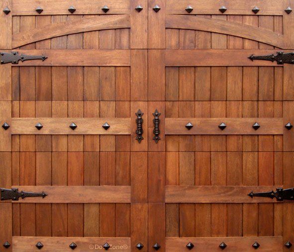 Vertical barn style single wooden garage door