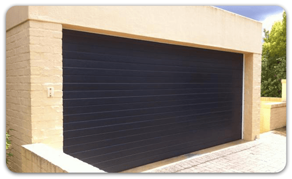 Colour steel sectional garage door example in brown