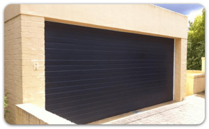 Home with insulated colour steel chromadek garage door