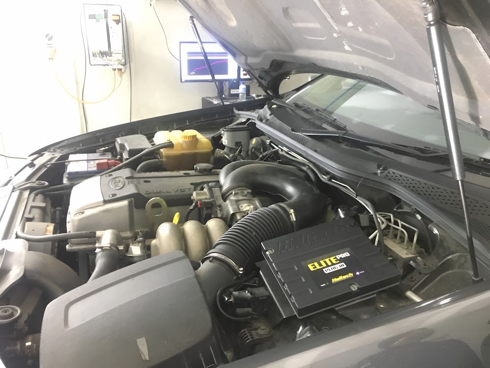 The Engine Of A Car Is Shown With The Hood Open — Hunter Automotive In Bungalow, QLD