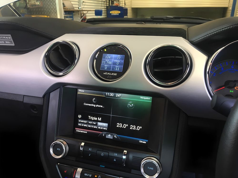 The Dashboard Of A Ford Mustang With A Touchscreen Radio — Hunter Automotive In Bungalow, QLD