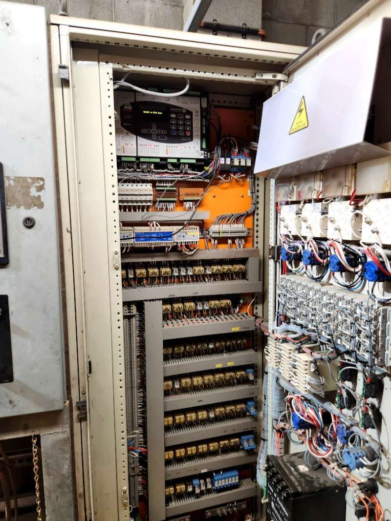 A Large Electrical Cabinet With A Lot Of Wires Coming Out Of It — Great Energy in Portsmith, QLD